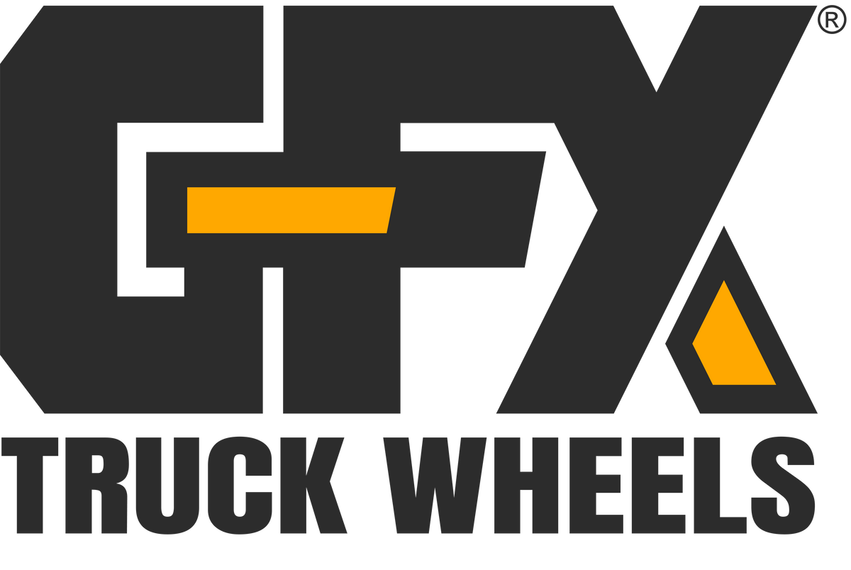 The logo for G-FX Truck Wheels, featuring a bold black stylized 'GFX' with a yellow accent bar and a yellow triangle, above the words 'TRUCK WHEELS' in black sans-serif text on a white background.
